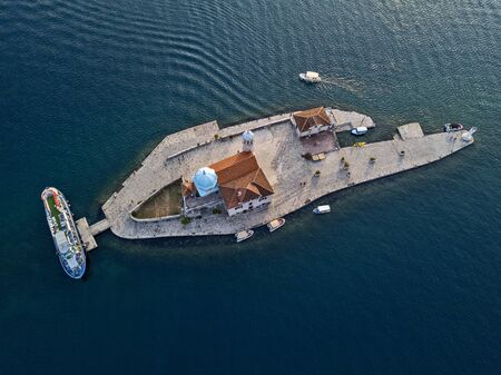 Aerial view of Our Lady of the Rocks is one of the two islets off the coast of Perast in Bay of...