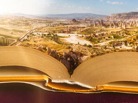 Travel and vacation book, explore the world. A book for traveling, tour guide. Cappadocia, Goreme, Anatolia. Turkey. GÃ¶reme, rock formations, fairy chimney. Plan a trip, adventures in the worldの写真素材
