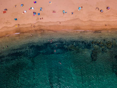 Aerial view of the jagged shores and beaches of Lanzarote, Spain, Canary. Roads and dirt paths....