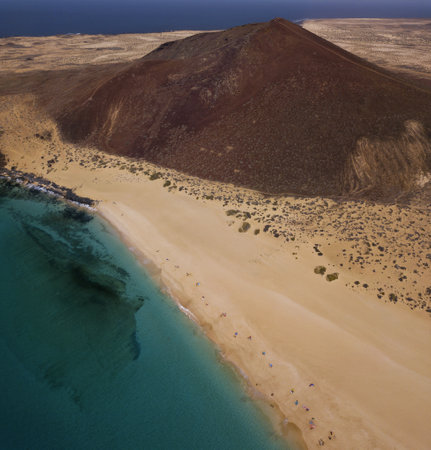 Aerial view of the Playa de las Conchas and mountain Bermeja, La Graciosa island in Lanzarote, Canary island. Spain. Ocean view and sand beachの写真素材