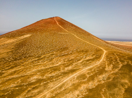 Aerial view of the Playa de las Conchas and mountain Bermeja, La Graciosa island in Lanzarote,...