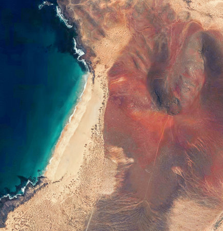 Aerial view of the Playa de las Conchas and mountain Bermeja, La Graciosa island in Lanzarote,...
