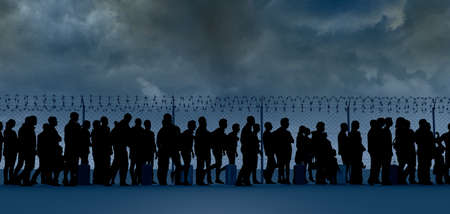 Refugees and immigrants looking for a new life. Column of migrants near the state borders. Fence and...