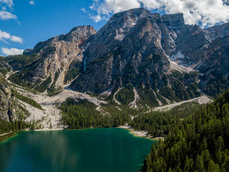 Aerial view of the Lake Braies, Pragser Wildsee is a lake in the Prags Dolomites in South Tyrol, Italy. View of Croda del Becco mountain in the backgroundの写真素材