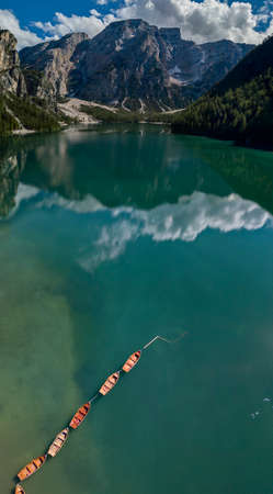 Aerial view of the Lake Braies, Pragser Wildsee is a lake in the Prags Dolomites in South Tyrol, Italy. View of Croda del Becco mountain in the backgroundの写真素材
