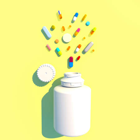 Assorted pharmaceutical medicine pills, tablets, capsules. White medicine bottle. Copy space for text on a yellow background. Pills, various medicines, on prescriptionの写真素材