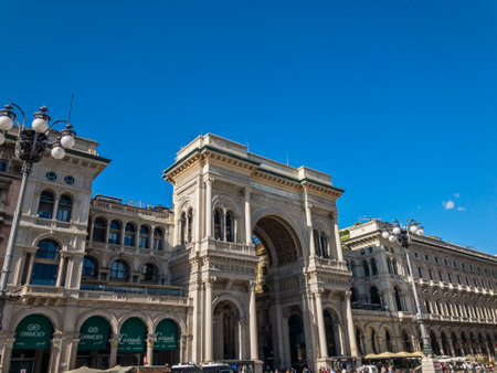 The Galleria Vittorio Emanuele II is Italy's oldest active shopping gallery and a major landmark of Milan, Italy. Entrance from Piazza Duomo. Milan. Italy. 05-20-2021. Palaces and architectureのeditorial素材