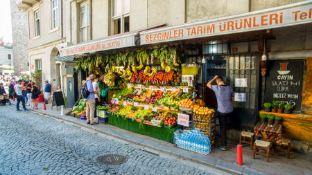 Street life under the Galata tower Galata-KarakÃ¶y quarter of Istanbul, Turkey. 06-22-2019. Fruit and vegetable shopのeditorial素材