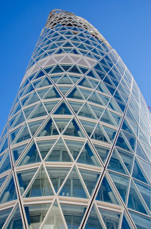 Architecture, new architectural forms, lines and new buildings. Design of buildings in the heart of Milan. Skyscrapers and buildings close Piazza Gae Aulenti. Unipol tower, 02-02-2022. Italyのeditorial素材