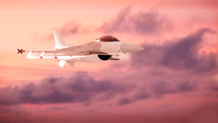 Military aircraft in flight equipped with missiles, combat set-up. F-16. The General Dynamics F-16 Fighting Falcon is an American single-engine supersonic multirole fighter aircraの写真素材