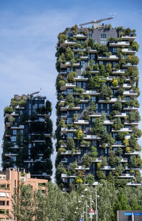 View of the balconies and terraces of Bosco Verticale, full of green plants. Spring time. 08â08-2023. Milan, Porta Nuova skyscraper residences, Italy. Bam, tree libraryのeditorial素材