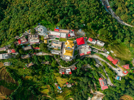 Aerial view of the Thrangu Tashi Yangtse Monastery or Namo Buddha Monastery is a Tibetan Buddhist monastery, close to Kathmandu, it lies at the top of the hill. Nepal 10-03-2023のeditorial素材