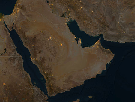 Night satellite view of the Arabian Peninsula. Illuminated cities and main roads, national borders. Physical map with reliefs.の写真素材