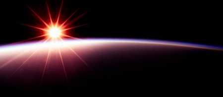 Sunrise seen from space, Earth orbit atmosphere. View of the Earth from space, curvature of the horizon. 3d renderingの写真素材
