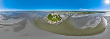 Aerial view of the Mont Saint Michel Abbey, Normandy. France. Island. Architectural details, spire...