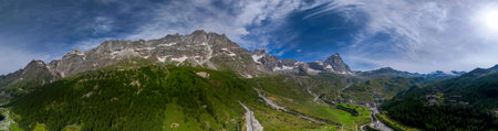 Aerial view of Mount Cervino, The Matterhorn, seen from Breuil-Cervinia. Green valleys and waterways that descend from the glaciers. Italyの写真素材