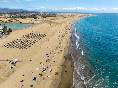 Aerial view of Maspalomas beach and dunes, sunbathers enjoying themselves, Gran Canaria, Spain.の写真素材