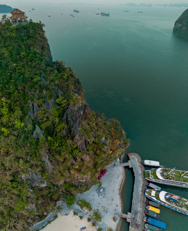 Aerial view of Ti Top Beach island, Ha Long Bay, Halong Bay is a popular travel destination, Vietnam. Cruise ships and islands. Sunsetの写真素材