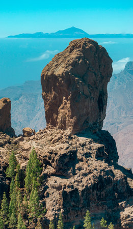 Aerial view of Roque Nublo, Gran Canaria. In the background the island of Tenerife with Teide the volcano. Large volcanic formation in Gran Canariaの写真素材
