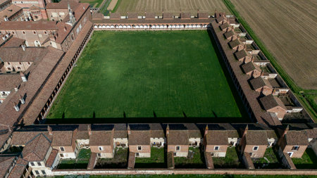 Aerial view of the Certosa di Pavia, built in the late fourteenth century, courts and the cloister of the monastery and shrine in the province of Pavia, Lombardia, Italyの写真素材
