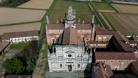 Aerial view of the Certosa di Pavia, built in the late fourteenth century, courts and the cloister of the monastery and shrine in the province of Pavia, Lombardia, Italyの写真素材