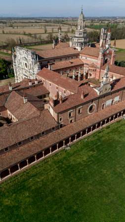 Aerial view of the Certosa di Pavia, built in the late fourteenth century, courts and the cloister of the monastery and shrine in the province of Pavia, Lombardia, Italyの写真素材