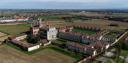 Aerial view of the Certosa di Pavia, built in the late fourteenth century, courts and the cloister of the monastery and shrine in the province of Pavia, Lombardy, Italy.の写真素材