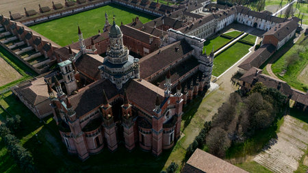Aerial view of the Certosa di Pavia, built in the late fourteenth century, courts and the cloister of the monastery and shrine in the province of Pavia, Lombardia, Italyの写真素材