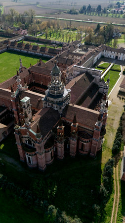 Aerial view of the Certosa di Pavia, built in the late fourteenth century, courts and the cloister of the monastery and shrine in the province of Pavia, Lombardia, Italyの写真素材