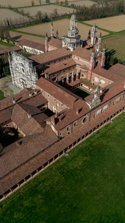 Aerial view of the Certosa di Pavia, built in the late fourteenth century, courts and the cloister of the monastery and shrine in the province of Pavia, Lombardy, Italy.の写真素材