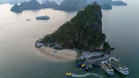 Aerial view of the Háº¡ Long Bay, Halong Bay. Vietnam. Cruise ships and islands alternate in the bay. Sunsetの写真素材