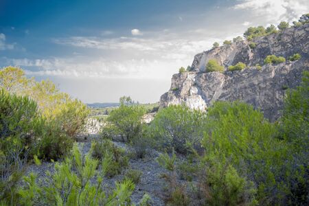 mountain with plants and quarry with a blue skyの写真素材