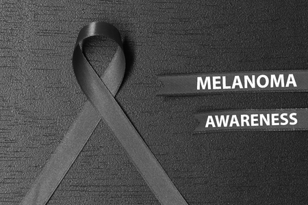 Black ribbon. melanoma awareness. Healthcare and medicine concept.の写真素材