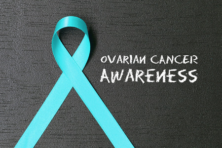 Teal ribbon. Ovarian cancer awareness. Healthcare and medicine concept.の写真素材