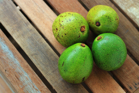 Avocado on wooden backgroundの写真素材