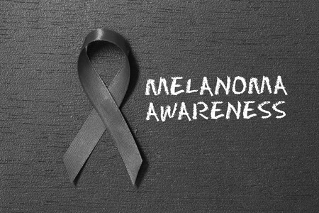 Black ribbon. melanoma awareness. Healthcare and medicine concept.の写真素材