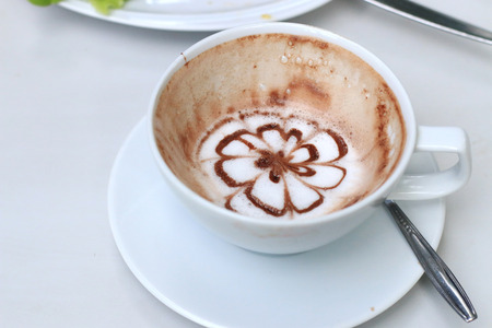 Empty cup of cocoa on tableの写真素材