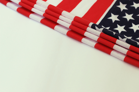 Closeup of American flag on plain backgroundの写真素材