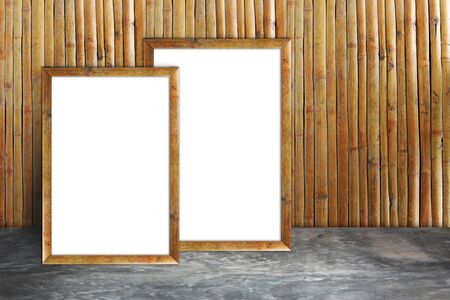 white frame on a Bamboo wall and concrete floorの写真素材