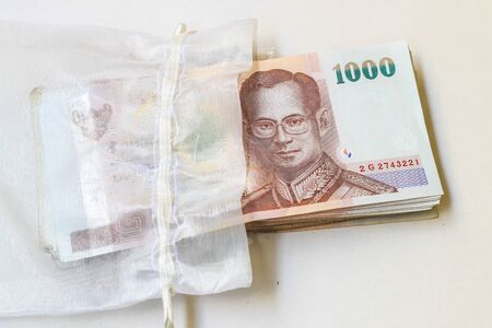 Thai money in the bagの写真素材