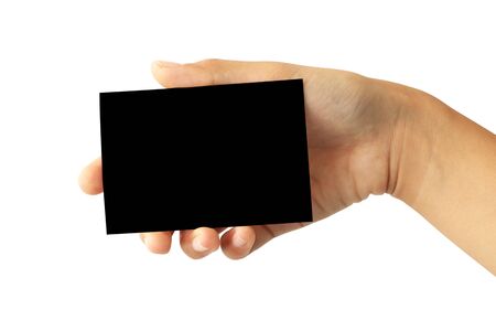 Woman hand holding blank black paper card isolated on white backgroundの写真素材