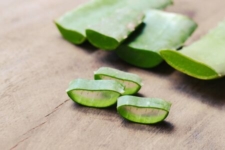 Aloe Vera leaves on wooden backgroundの写真素材