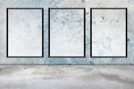 white frame on a concrete wall and floor