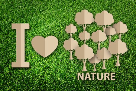 Paper cut of eco on green grassの写真素材