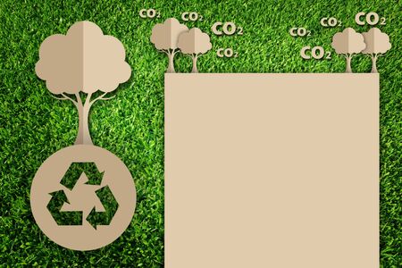 Paper cut of eco on green grass
