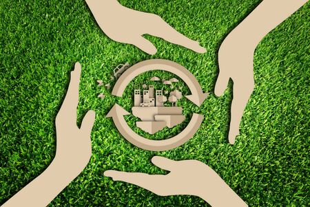 Paper cut of eco on green grassの写真素材