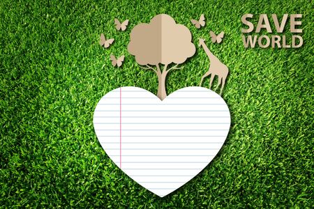 Paper cut of eco on green grassの写真素材