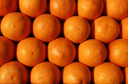 Group of oranges ready for juicing; can be used as background