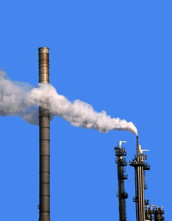 One chimney releasing a fantastic amount of smoke.の写真素材