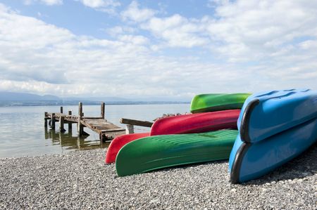 Canoes at Lake Geneva or Lake Lï¿½man (French: Lac Lï¿½man, Lï¿½man) This lake is situated  in Switzerland and France. It is one of the largest lakes in Western Europe.の写真素材